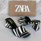 Strut in Style: Zebra Print Heeled Sandals