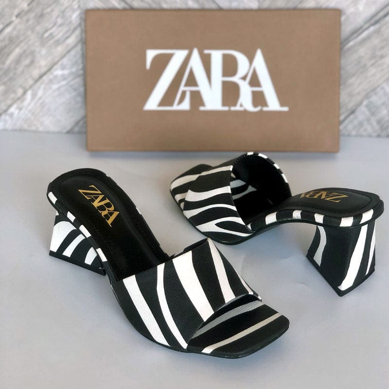 Strut in Style: Zebra Print Heeled Sandals